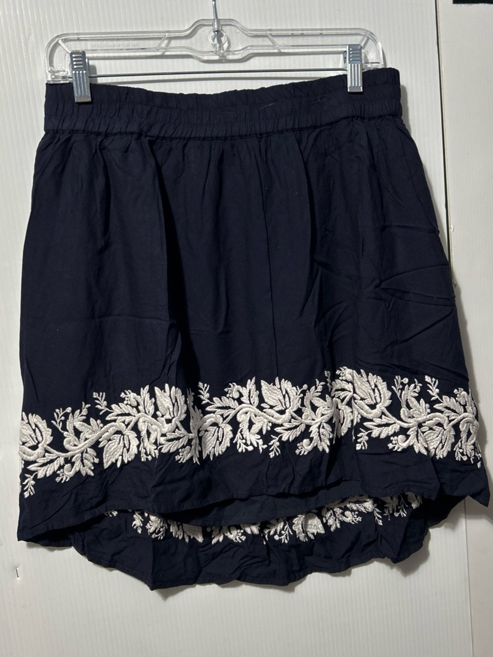 A Pea in the Pod Navy High-Low Skirt with White Embroidered Hem